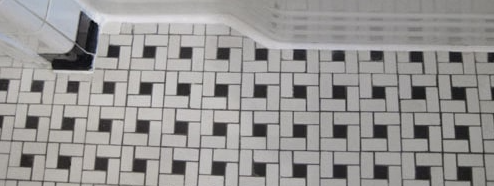 Tile with caulk lines