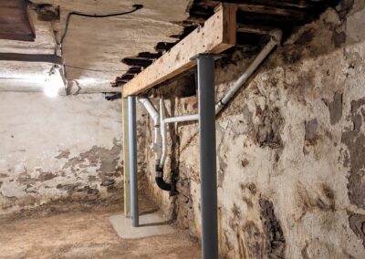 stone basement beam and steel posts - RPK Construction LLC